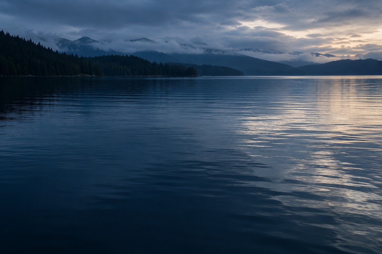 Misty lake and evergreen forest from the Anuluna website